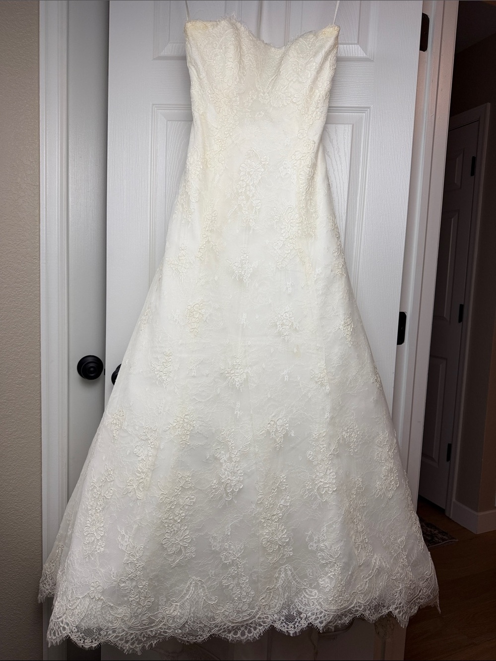 Bliss by Monique Lhuillier strapless lace wedding dress in Ivory